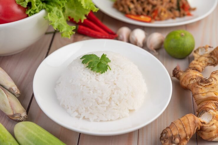 Perfect fluffy rice in a bowl with a fork