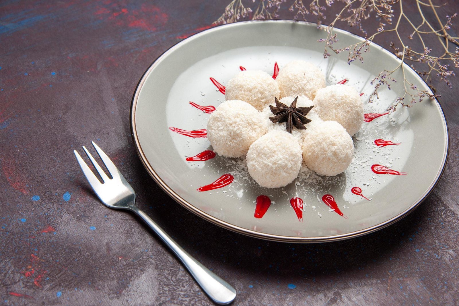 Soft fluffy idli on a plate with coconut chutney and sambar