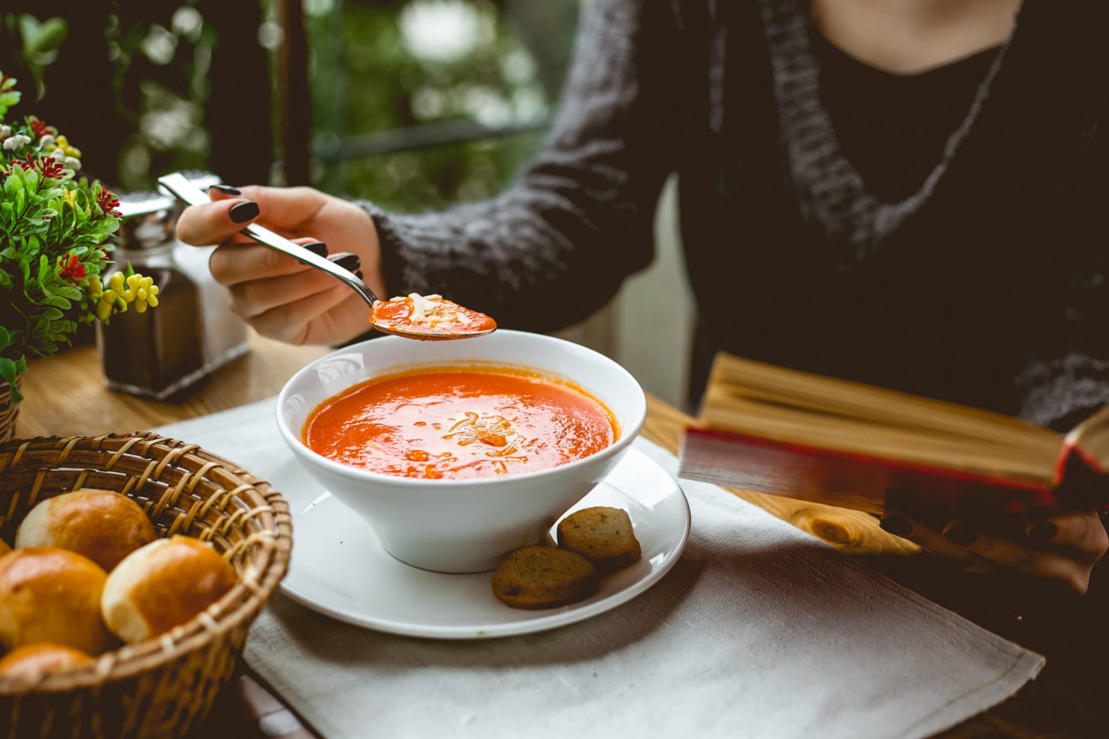 Traditional breakfast soups from different cultures served in bowls
